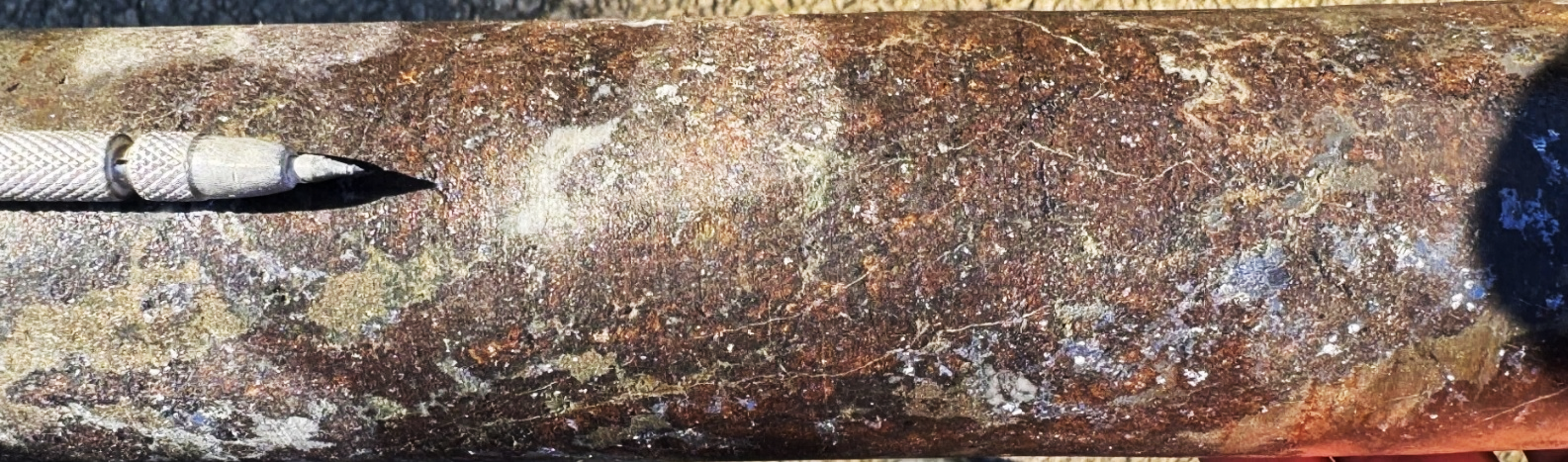 A person holding a pipeAI-generated content may be incorrect.